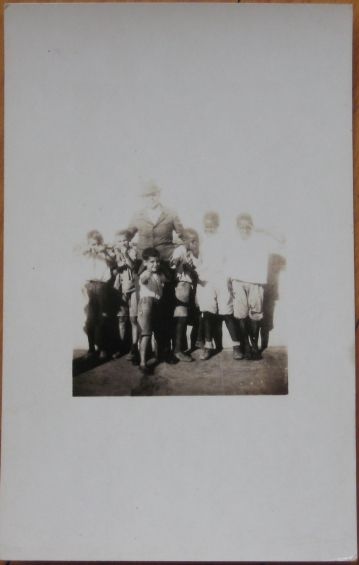 1920 Realphoto Postcard Man with Black Children  