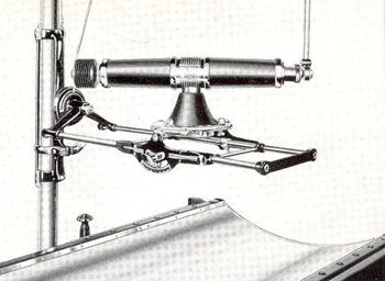 The above diagram shows an XP tube mounted above a patient table.