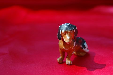 Antique OLD Porcelain Doxie Dachshund dog sitting up  