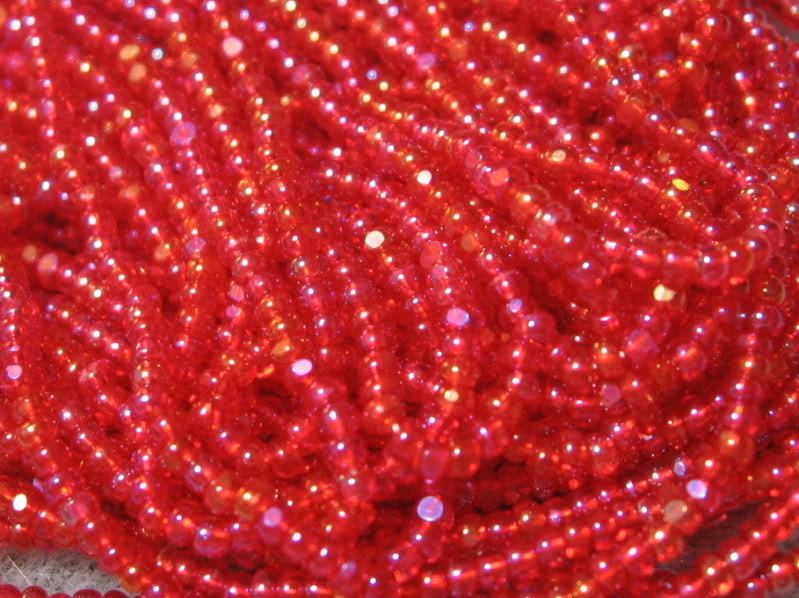 13/0 HANK CHARLOTTE CUT LIGHT RED AB TRANS. SEED BEADS  